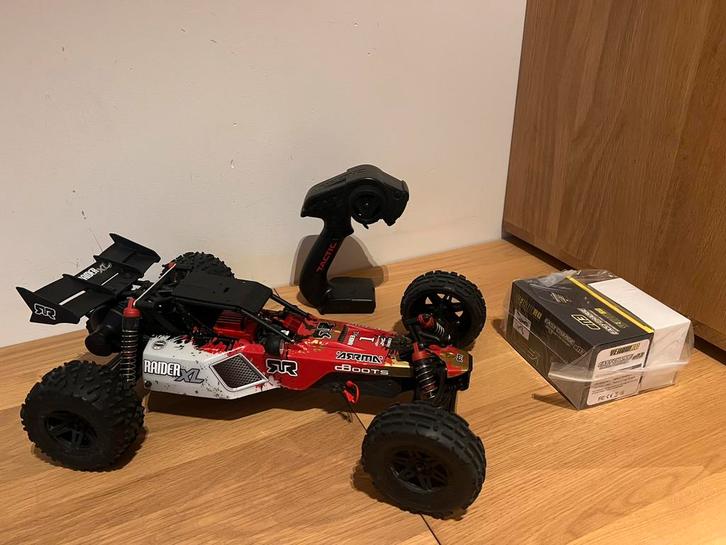Racewagen: AR102712 1/8 RAIDER XL 2WD RTR BRUSHED BUGGY, Hobby en Vrije tijd, Modelbouw | Radiografisch | Auto's, Zo goed als nieuw