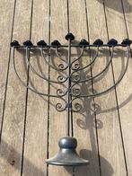 Grote kandelaar, Ophalen