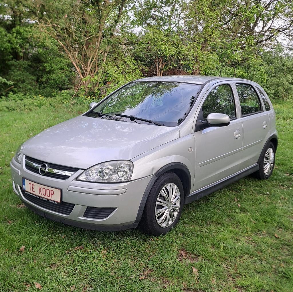 Opel Corsa: 102.000km + airco +jaar garantie +groot nazicht!, Auto's, Voorwielaandrijving, Stof, 129 g/km, 4 cilinders