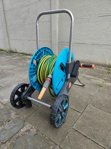 Tuinslang op haspel Gardena L = 18 meter voor 40 euro, Tuin en Terras, Ophalen, Zo goed als nieuw, Tuinslang