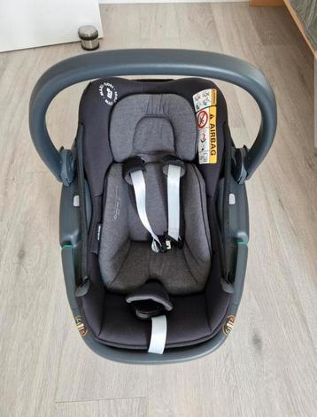 Maxicosi Coral met geintegreerde zonnekap en verkleinkussen. beschikbaar voor biedingen