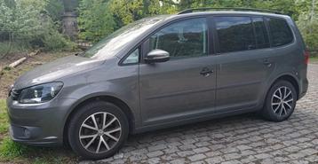 VW Touran met panoramisch schuifdak en trekhaak