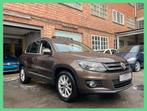 Volkswagen Tiguan 1.4 TSI Sport * Leder/Gps/Pano.Dak *, Auto's, Volkswagen, 90 kW, Euro 5, USB, Zwart