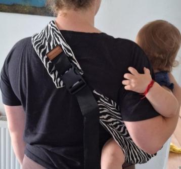 Babydrager Peuterdrager zijdrager heupdrager zoals wildride  beschikbaar voor biedingen
