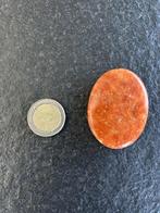 Helende steen : vuurcalciet, Enlèvement