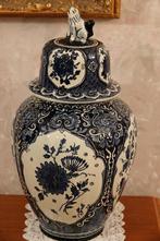 Vase en faïence de Delft, Ophalen