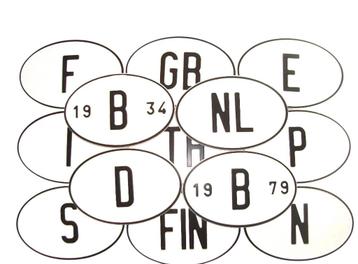 Ovale plaat van gestempeld aluminium - Vintage Country Code beschikbaar voor biedingen