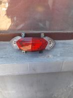 Peugeot Kisbee achterlicht, Ophalen