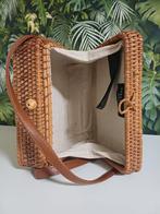 Rieten schoudertas., Ophalen