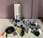 PlayStation 2 Zilver + 2 Controllers met multitap adapter, Games en Spelcomputers, Verzenden, Zo goed als nieuw