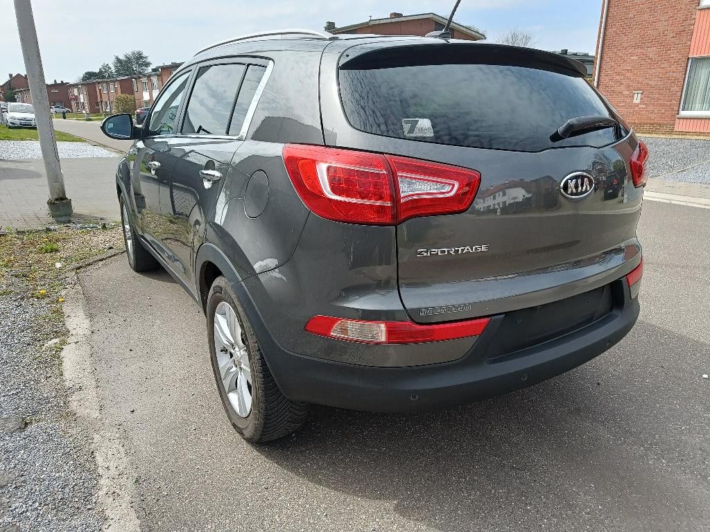 Kia Sportage grijs, Auto's, Kia, Voorwielaandrijving, Euro 5, 1380 kg, Parkeersensor