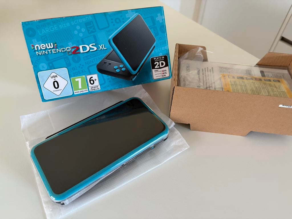 Nintendo New 2DS XL - Nooit gebruikt! (Nieuw), Games en Spelcomputers, Spelcomputers | Nintendo 2DS en 3DS, Nieuw, 2DS, Zwart