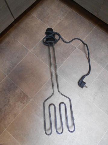 Grote elektrische grill-vork beschikbaar voor biedingen