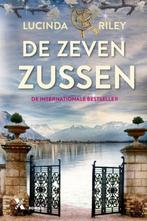 Te Koop Boek DE ZEVEN ZUSSEN Lucinda Riley, Boeken, Romans, Europa overig, Lucinda Riley, Ophalen of Verzenden, Zo goed als nieuw