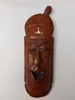 Sculpture en bois masque africain, Enlèvement