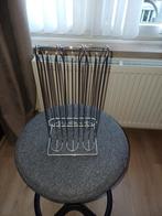 Porte capsules en acier, Ophalen