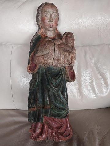 Antiek beeld madonna met kind beschikbaar voor biedingen