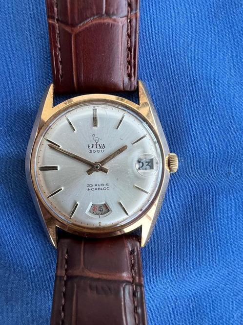 Helva 2000 Opwindbaar Vintage Herenhorloge, Handtassen en Accessoires, Horloges | Heren, Zo goed als nieuw, Polshorloge, Overige merken