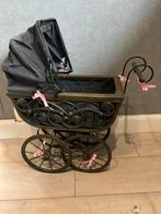 Antieke vintage poppenwagen, Ophalen