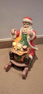Kerstdecoratie kerstman(keramiek) op slee €7, Ophalen of Verzenden