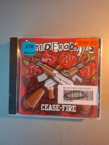 Cd. De Heideroosjes.  Cease-Fire. (Ex-Bibliotheek). beschikbaar voor biedingen