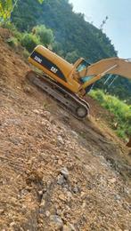 Caterpillar 320cl (bj 2006), Graafmachine