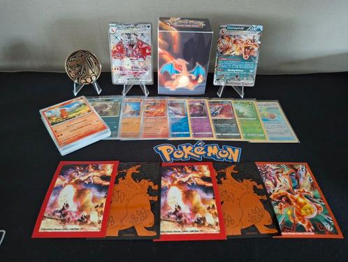 Charizard pakket met 2 Charizards waarvan 1 zeldzame., Hobby en Vrije tijd, Verzamelkaartspellen | Pokémon, Zo goed als nieuw