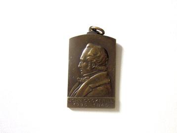 Bronzen medaille van John Cockerill 1947 Vertaling van de as