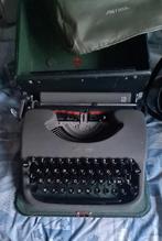 Ancienne machine à écrire, Ophalen