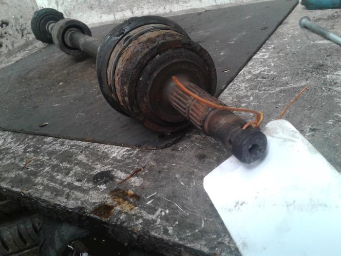 Aandrijfas rechts-voor van een Opel Combo, Auto-onderdelen, Remmen en Aandrijving, Opel, Gebruikt, 3 maanden garantie, Ophalen of Verzenden