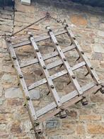 Ancienne herse en bois et métal