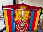 Poppenkast, Ophalen