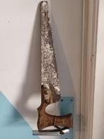 Scie égoïne ancienne, Enlèvement