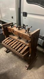 Antieke houten drukpers, Ophalen