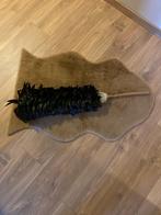 Antieke plumeau, Ophalen