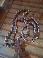 Grand chapelet/paternoster en bois de Lourdes, Enlèvement