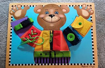 Melissa & Doug knopen en puzzel beschikbaar voor biedingen