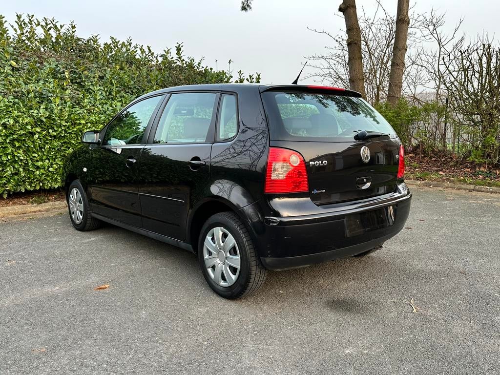 Volkswagen Polo Cricket Edition 1.2 Benzine 2005 €4 146.000k, Auto's, Voorwielaandrijving, Stof, Zwart, https://public.car-pass.be/vhr/d81b75a6-1d40-438e-a459-a61f62fb767e