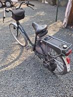 Sparta fiets met motor, Ophalen