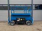 Genie GS4069BE Hoogwerker Schaarhoogwerker (bj 2015), Zakelijke goederen, Machines en Bouw | Liften, Steigers en Ladders