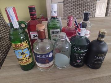 9 flessen gin te koop (ook apart) beschikbaar voor biedingen