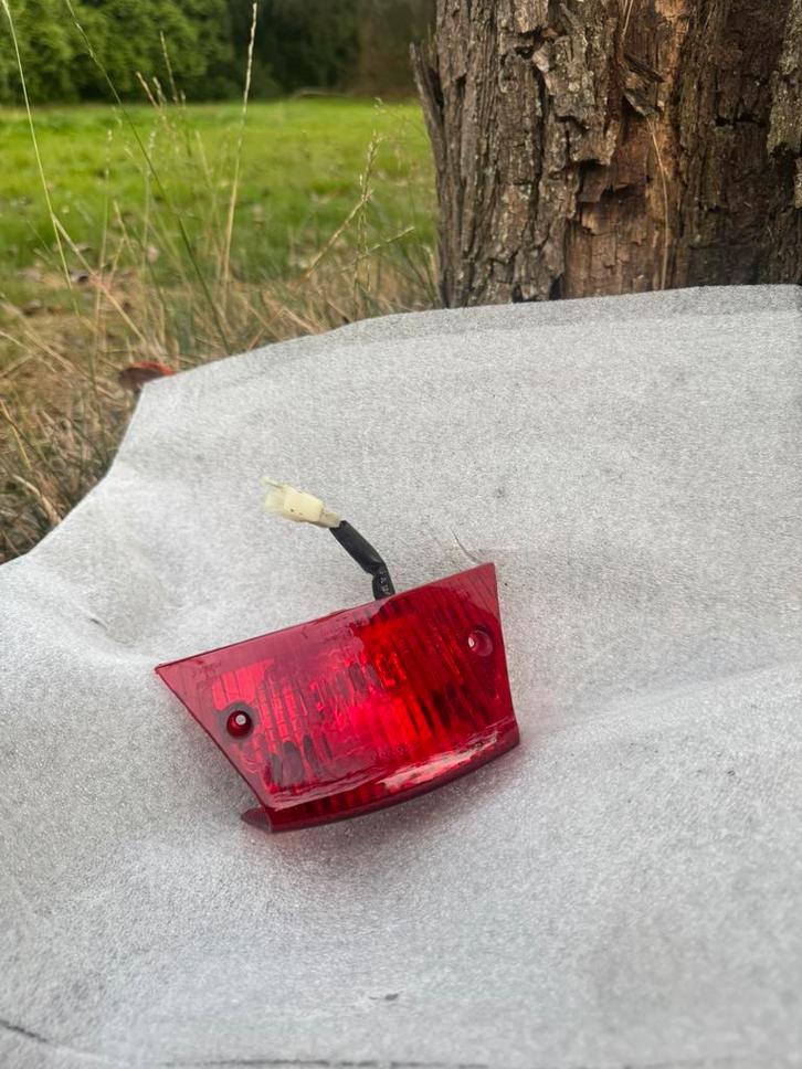 Piaggio zip originele achterlicht, Motoren, Onderdelen | Honda, Ophalen of Verzenden