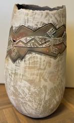 Handgemaakt vaas, Ophalen