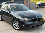 BMW 1 SERIE 116iA ✅AUTOMAAT BENZINE CARPLAY GARANTIE, 4 cilinders, Zwart, Berline, 5 deurs