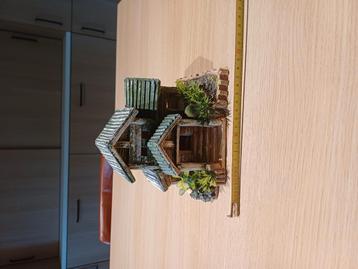 Houten hutje aquariumdecoratie  beschikbaar voor biedingen