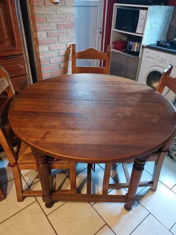 ronde eikenhouten uitschuifbare tafel met 4 stoelen  