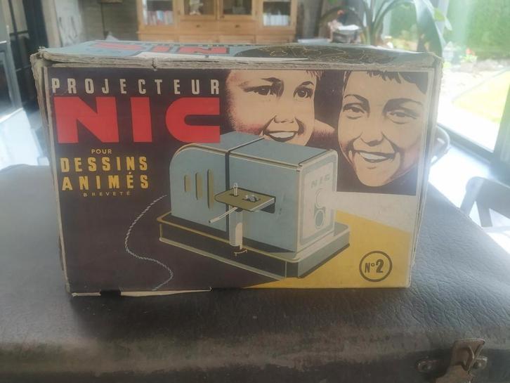 Zeldzame NIC-projector nummer 2 voor tekenfilms + 18 films, Antiek en Kunst, Antiek | Speelgoed, Ophalen of Verzenden