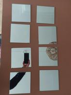 Spiegeltegels om te plakken, Enlèvement