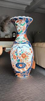 Koppel getekende Imari-vaasjes, Ophalen