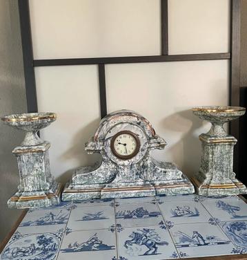 Set horloge et deux cassolettes, Enlèvement